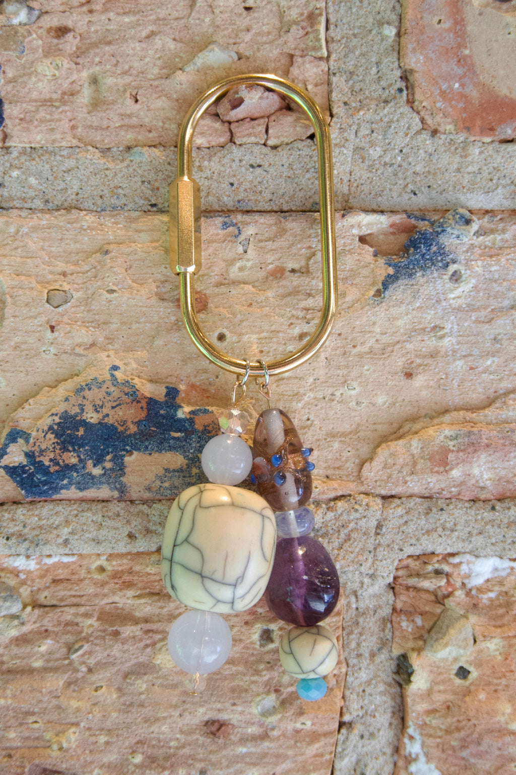 White Buffalo & purple bag charm