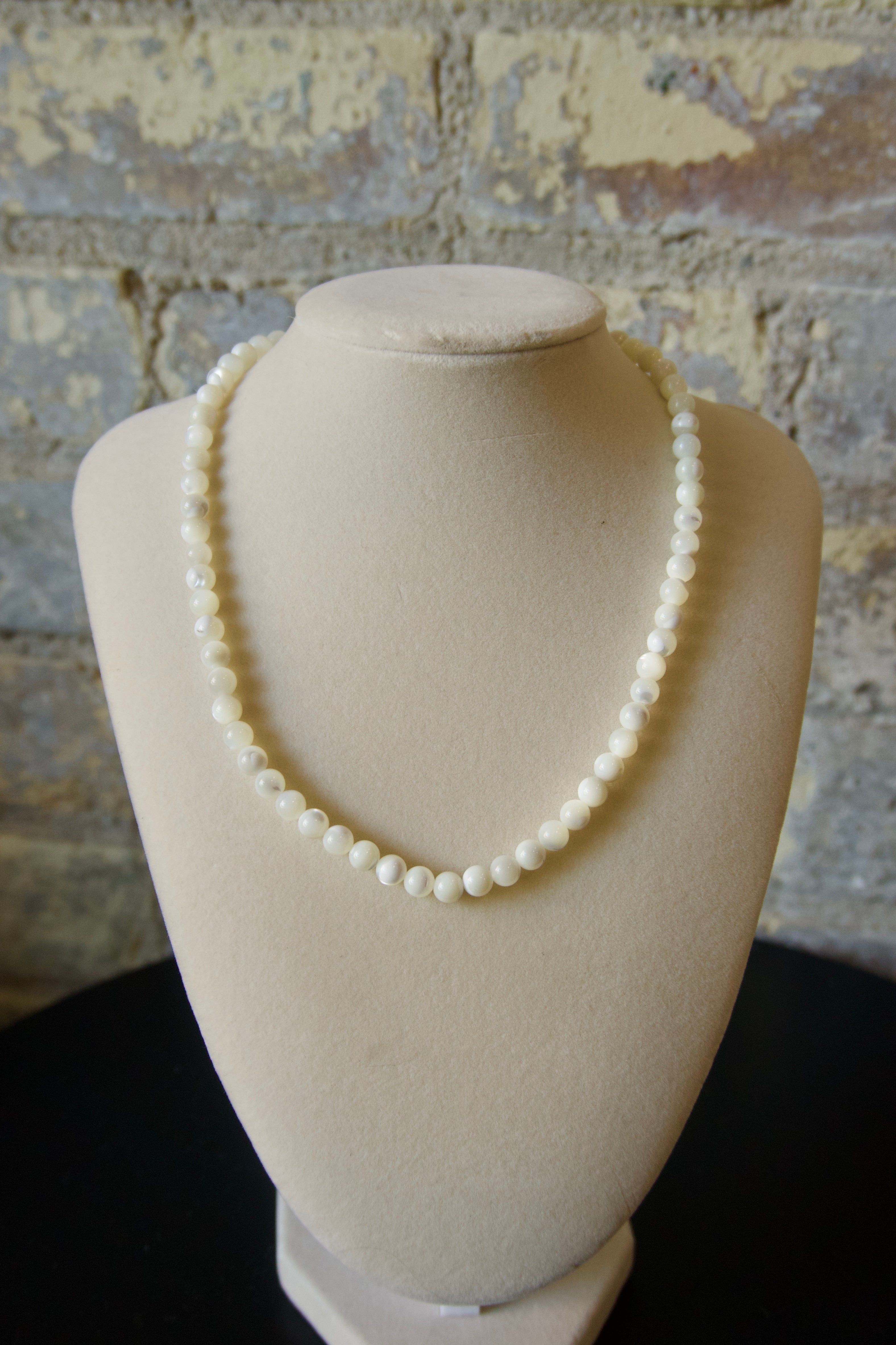 The mother of pearl necklace