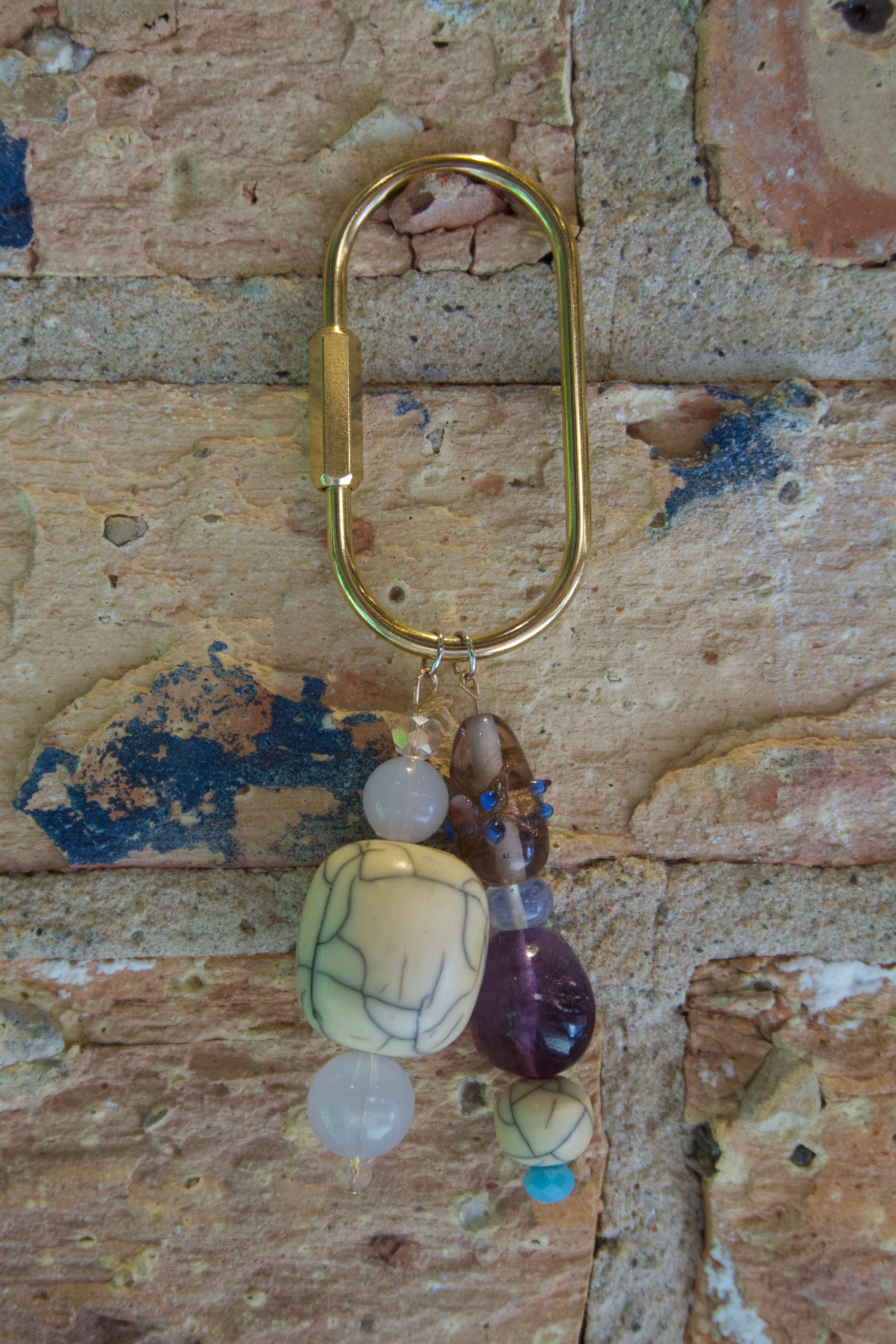 White Buffalo & purple bag charm
