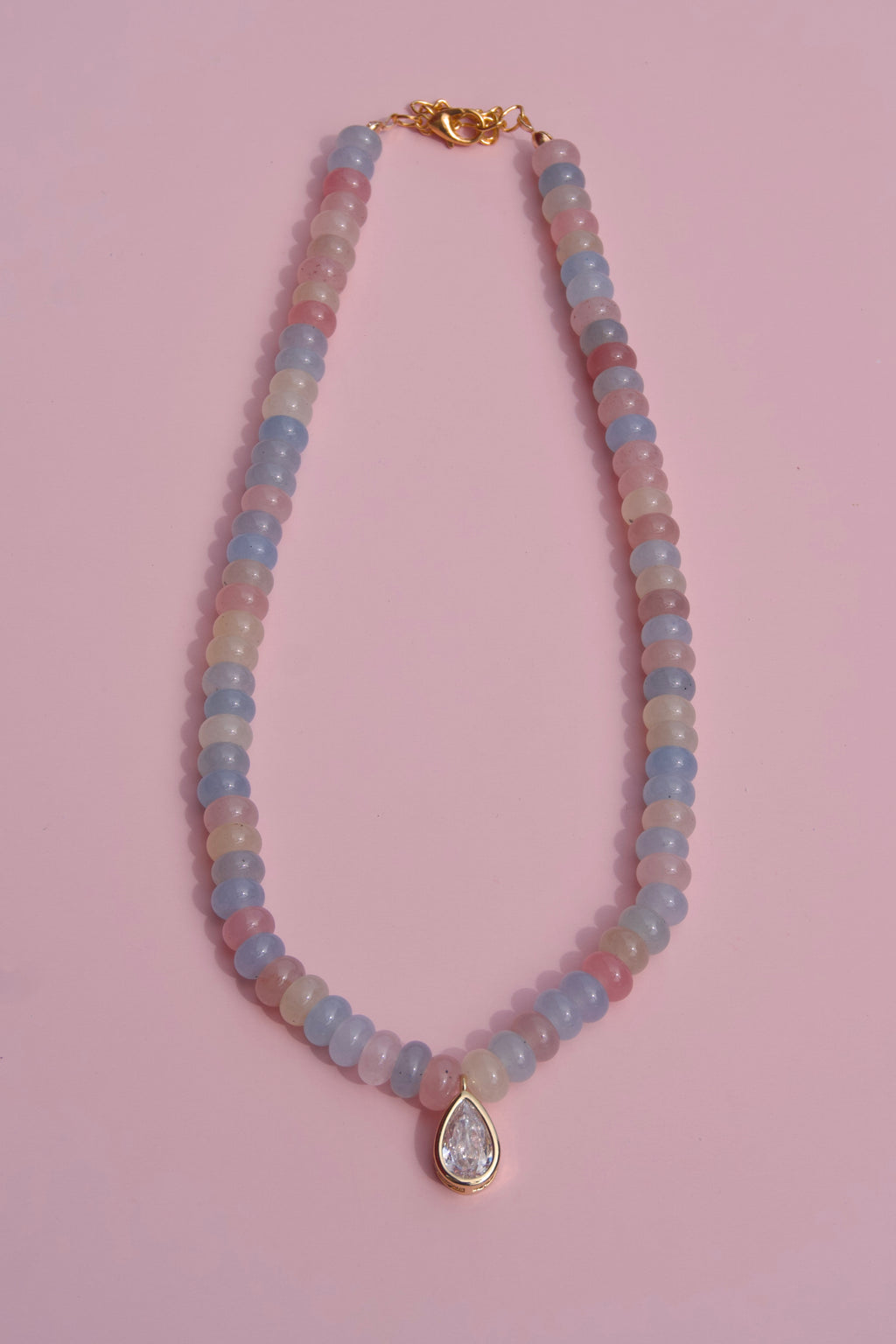 The muted multicolor + pear charm