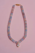 The muted multicolor + pear charm