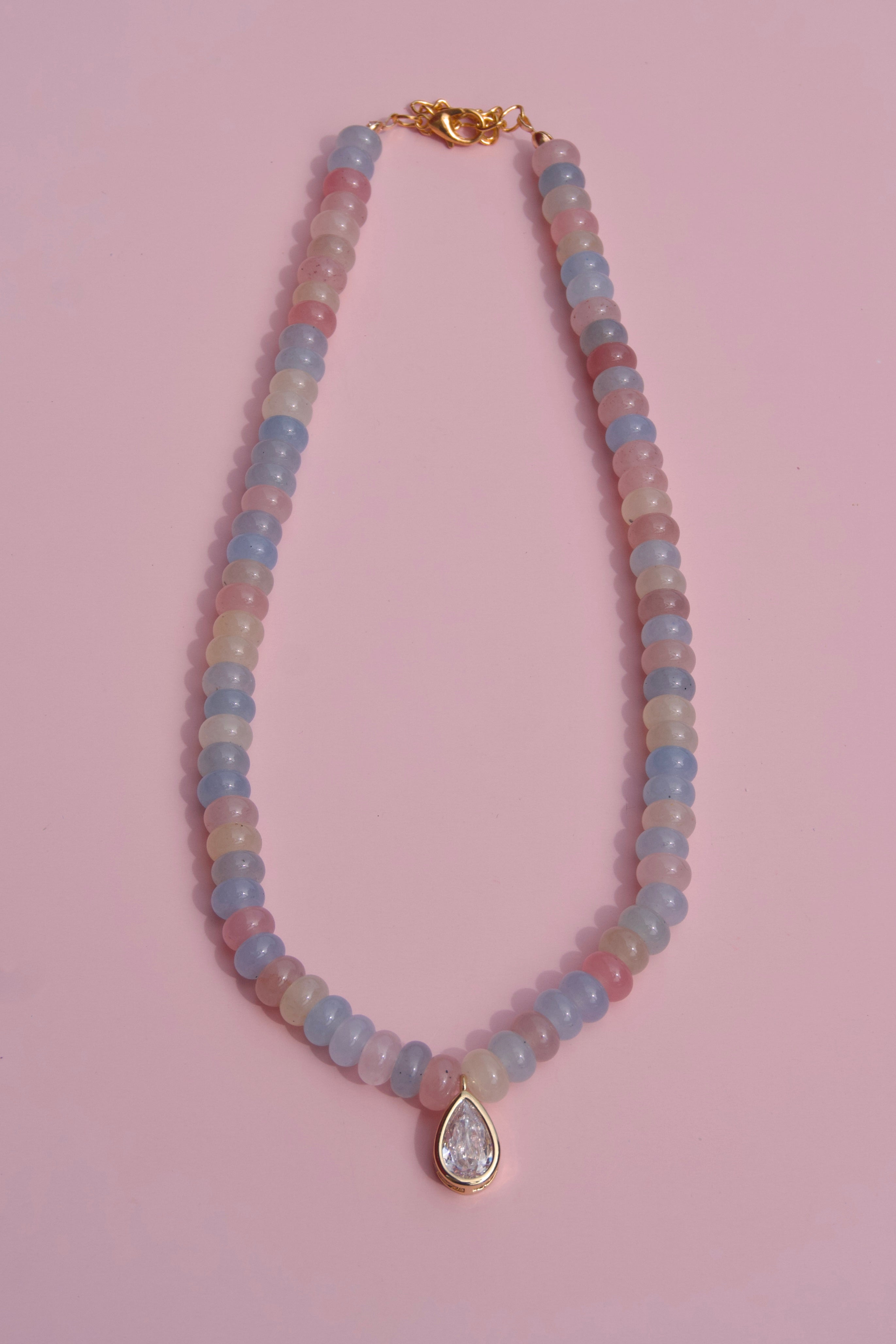 The muted multicolor + pear charm