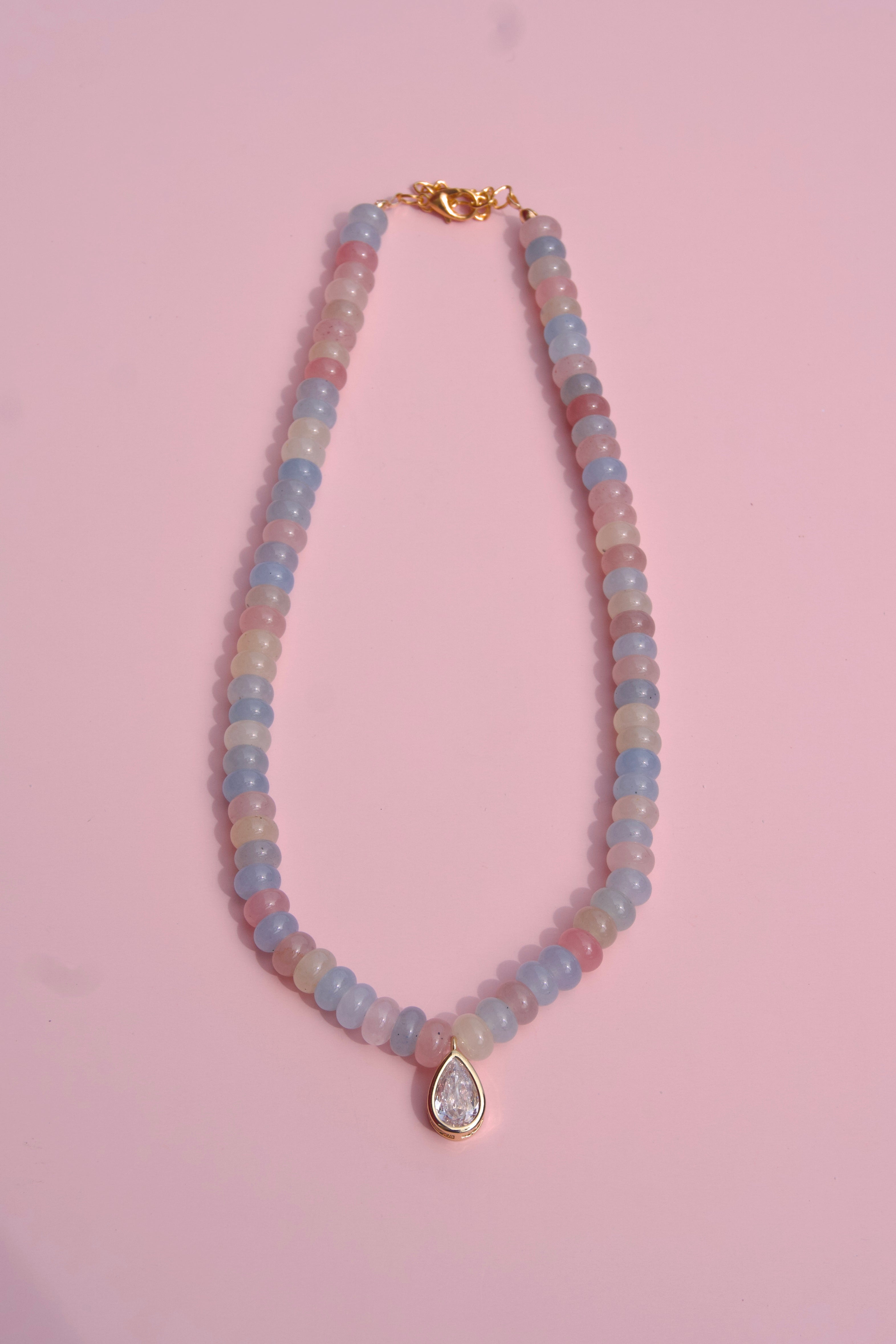 The muted multicolor + pear charm