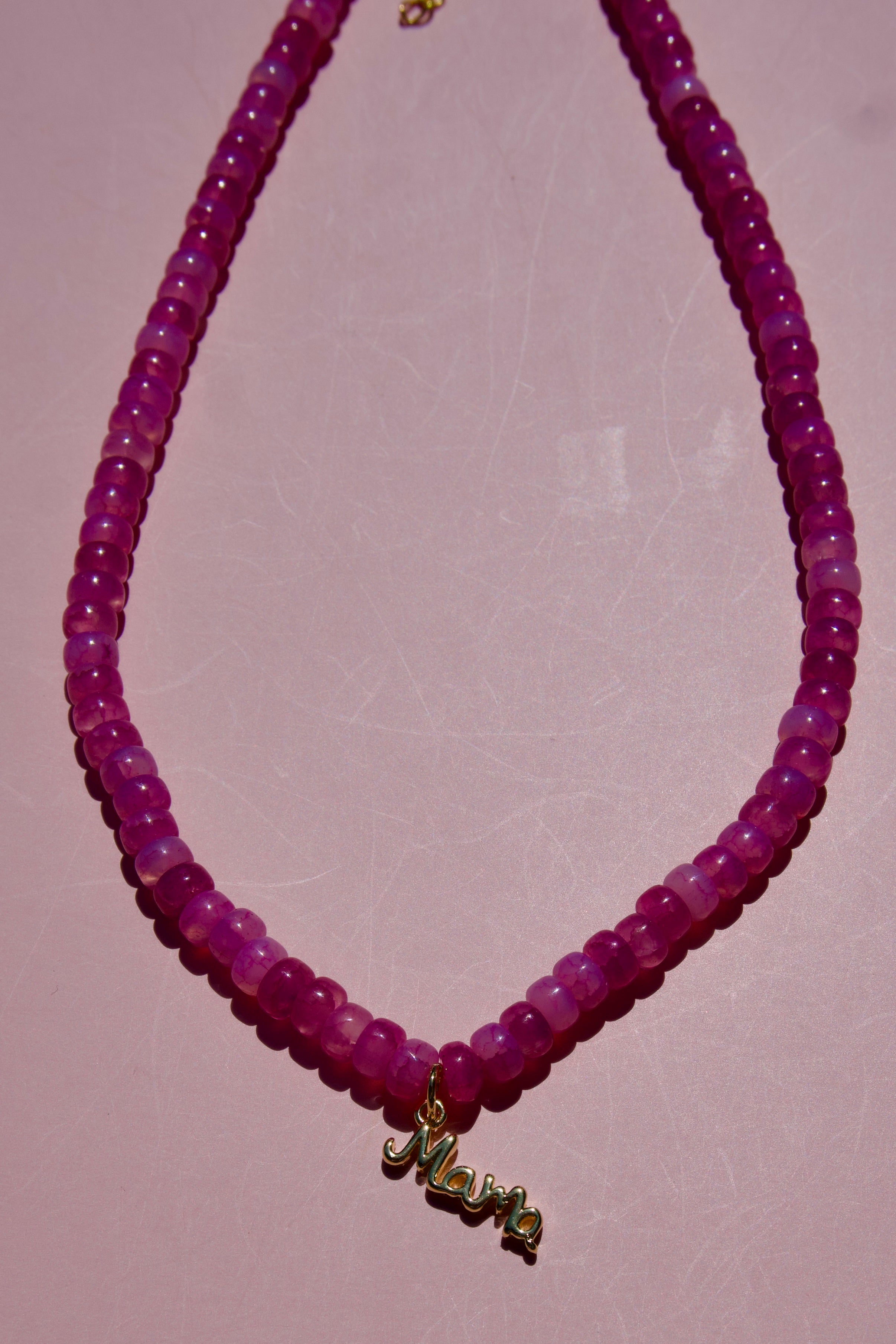 Fuchsia Beaded neckalce with Mama Charm