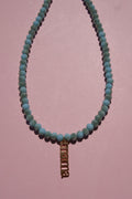 Baby Blue beaded necklace with Mama charm